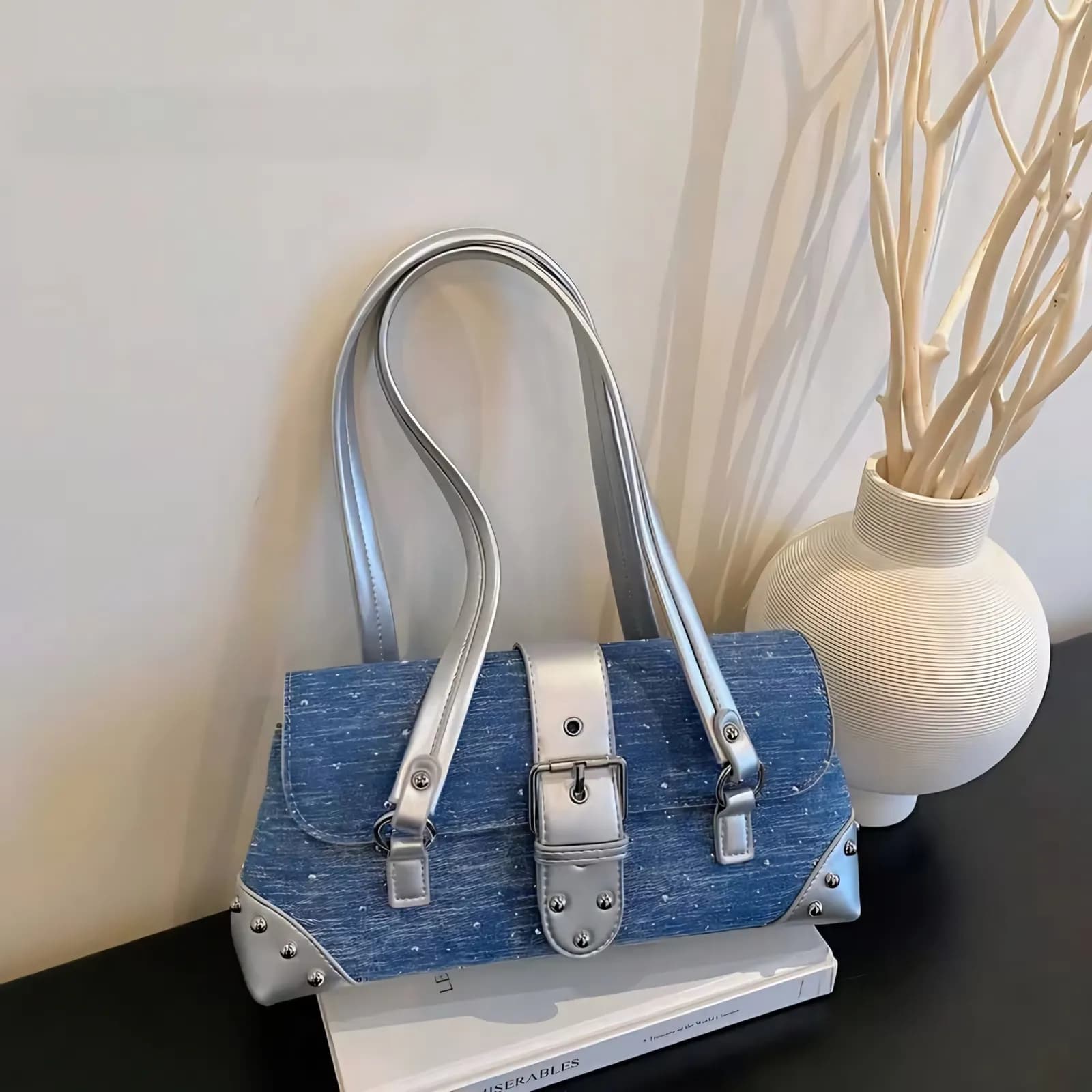 Dark denim blue Y2K sparkle shoulder bag with silver metallic straps and buckle