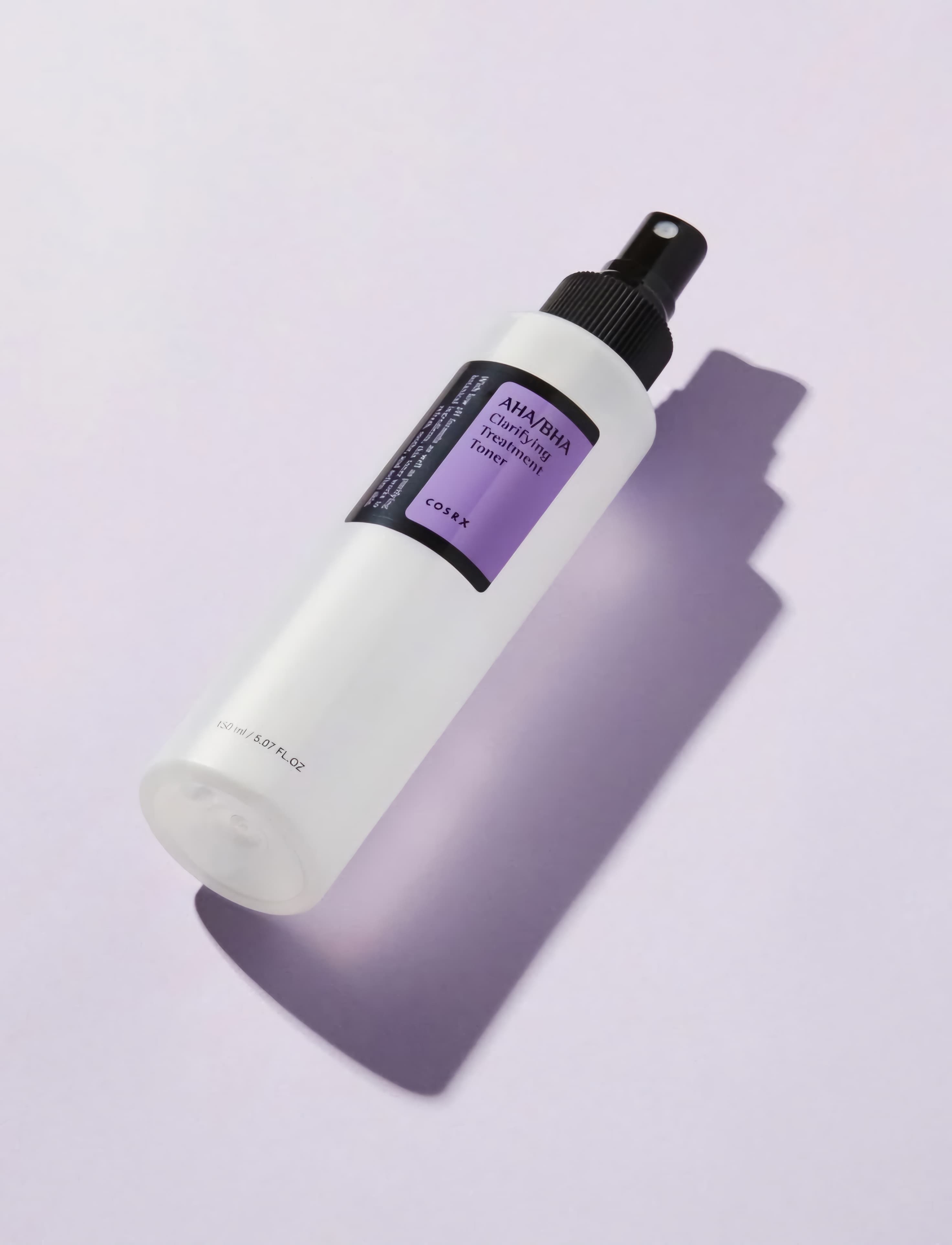COSRX exfoliating toner spray application close-up